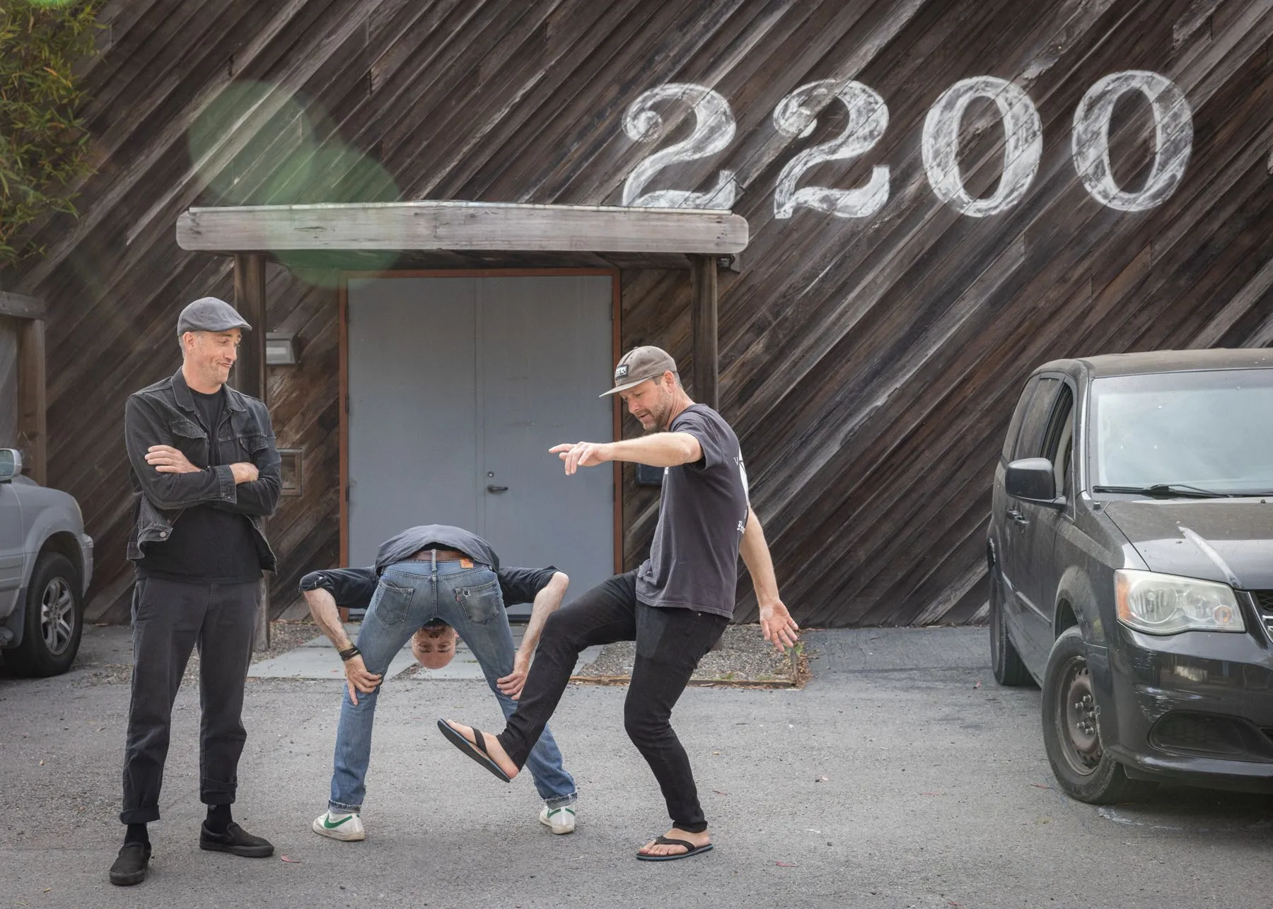 The band goofing outside 2200 Studios